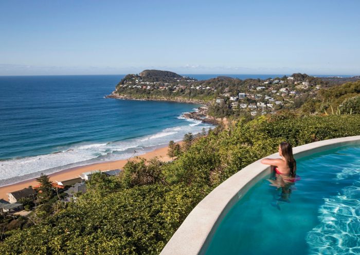 Jonah's, Whale Beach Woman enjoying ocean views from Jonah's on Whale Beach.